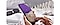 Close up shot of a hand holding a Samsung Galaxy S22 ultra while scolling through the smartphone home page