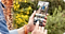 Samsung Galaxy smartphone showing photo gallery on screen