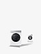 Two vacuums and a laundry appliance on a turqoise background with a roundel stating "Trade Up"