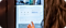 An image of a woman using a Galaxy tab tapping on the screen using SmartThings app to change the lights
