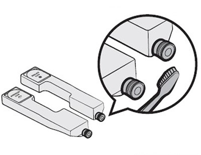 Clean the cap valves with a soft brush