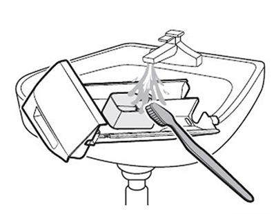 Rinse all parts under running water