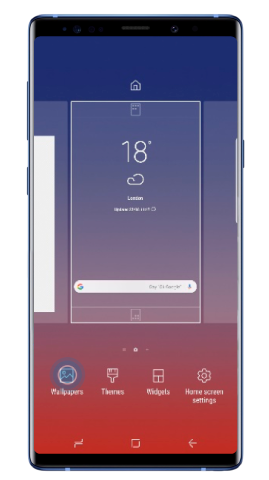 Tap and hold on the home screen and select Wallpapers