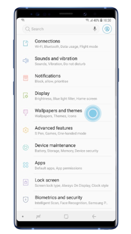 Open Settings and tap Wallpapers and themes