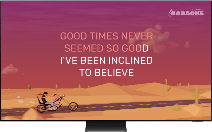 Karaoke lyrics displayed on a TV.