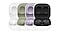 Four different colors of Galaxy Buds2 are shown in their cases, with the cases overlapping and the lids opened. The Galaxy Buds2 in White appear on the far left, overlapped in front by the Olive case, which is overlapped by the Phantom Violet case. The Graphite color case appears in full view on the right.