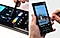 Two close-up photos of a man's hands (Caleb Natale) interacting with the Galaxy S22 Ultra and S Pen. The photos show the man using the S Pen to customize drawing tools and drawing over an image on the screen.