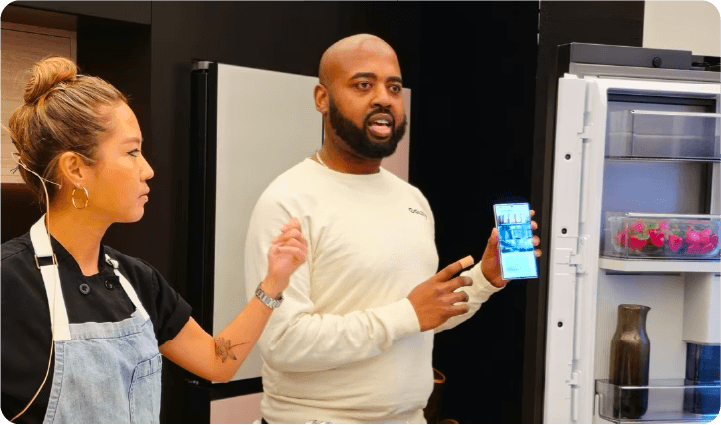 A Samsung associate leads a class on the possibilities of a smart home.