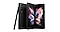 A Galaxy Z Fold3 5G lays open, with a colorful butterfly on the folding screen.