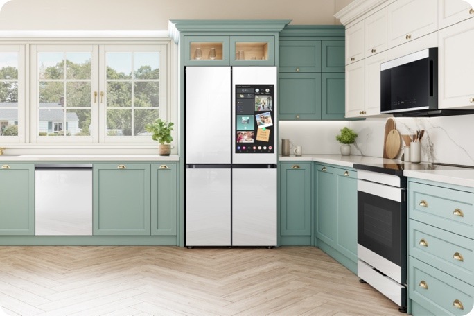 Samsung Bespoke 4-Door Flex™ with Family Hub™, Range, Microwave and Dishwasher in White Glass in kitchen with aqua cabinets