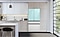Samsung Bespoke Refrigerator in a kitchen with white cabinets