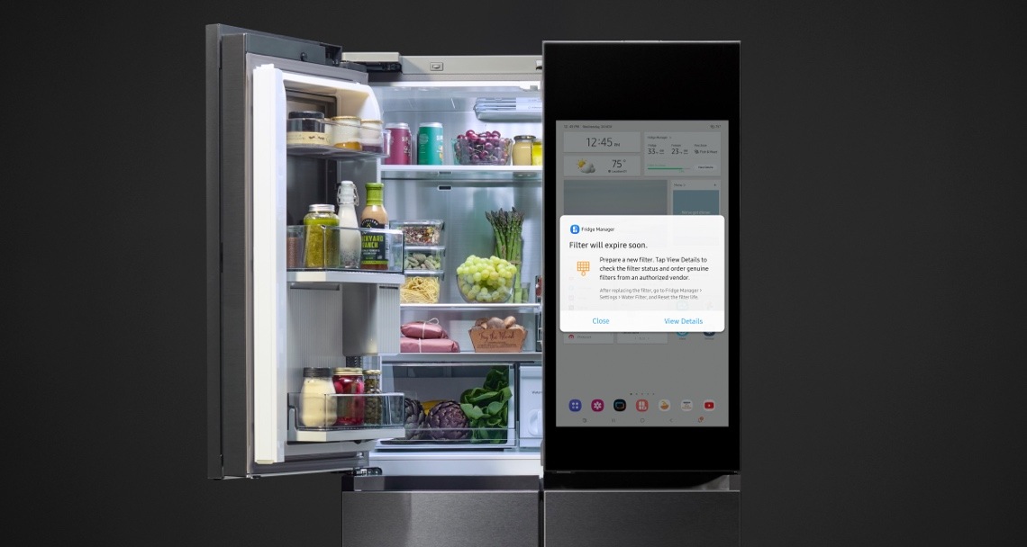 Bespoke 4-Door Flex™ Refrigerator with Family Hub™ with one door open and SmartThings notification message on the touchscreen