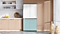 Samsung Bespoke 4-Door Flex™ Refrigerator in White Glass and Morning Blue Glass in a kitchen with light wood cabinets
