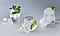 Three cocktail glasses each with clear liquid and garnish showing cubed ice, Ice Bites™ and Sphere Ice™