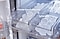 Interior of refrigerator with two ice trays with cubed and sphere ice