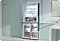 Refrigerator with doors open showing dual-cooling system
