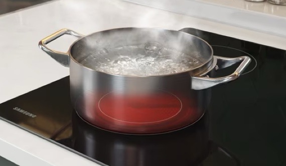 Pot on Cooktop Boiling Water