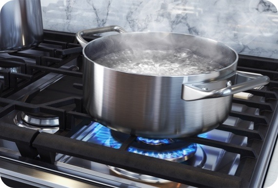 Gas Cooktop with a Pot of Boiling Water