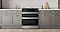 Stainless Steel Range with Double Ovens Among Bamboo Colored Cabinets