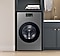 All-in-one washing machine and dryer combo in laundry room