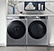 Side-by-side washer and dryer in laundry room
