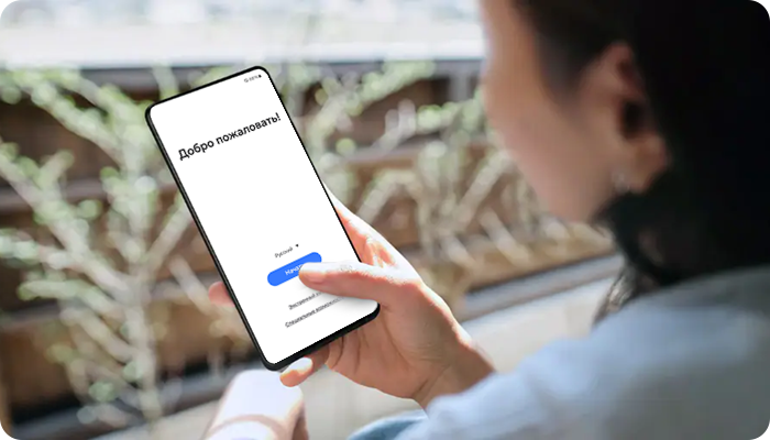 a girl holding a phone