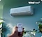A hand points a remote control to a Samsung Windfree. When a button is pressed, the fan closes and mist comes out of the air conditioner, indicating cooling.