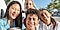 Four students smiling.
