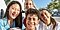 Four students smiling.