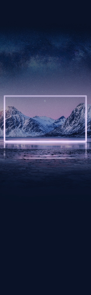 A neon white frame sits on a wide, icy lake surrounded by snow-covered mountains under a starry night sky.