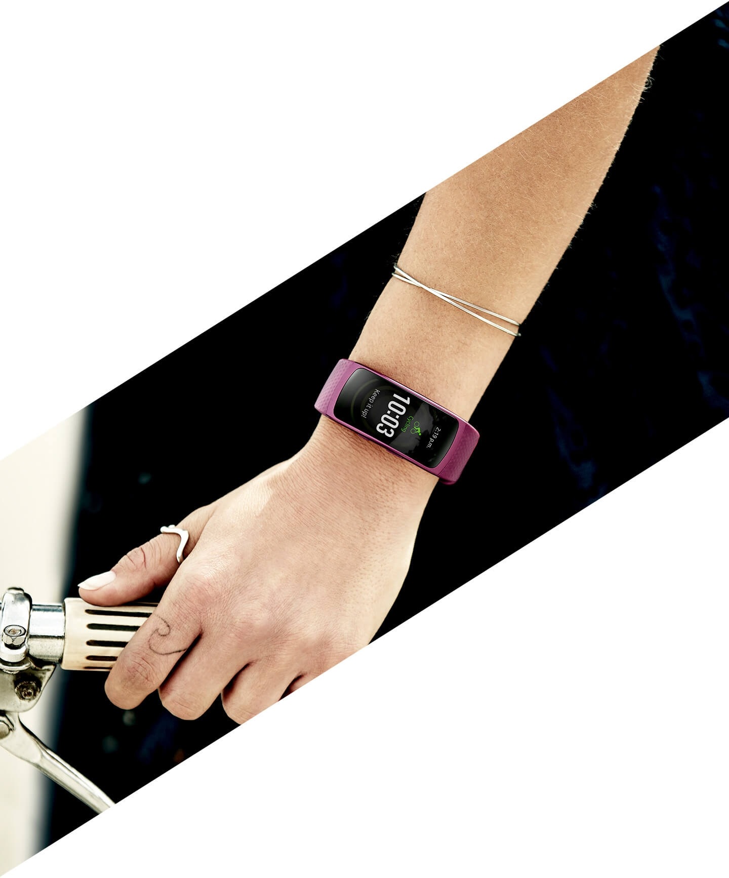 Stylish woman on a stylish bicycle wearing a Gear Fit2