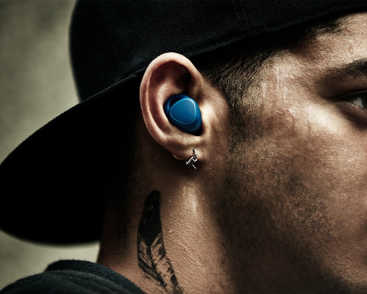Man running outside with Gear IconX in his ears