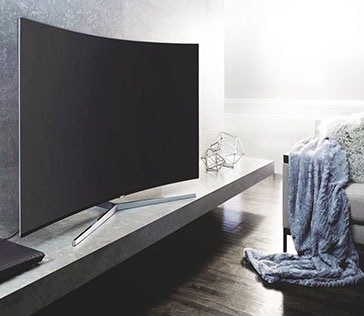 see large image of left perspective image of TV in a bedroom.