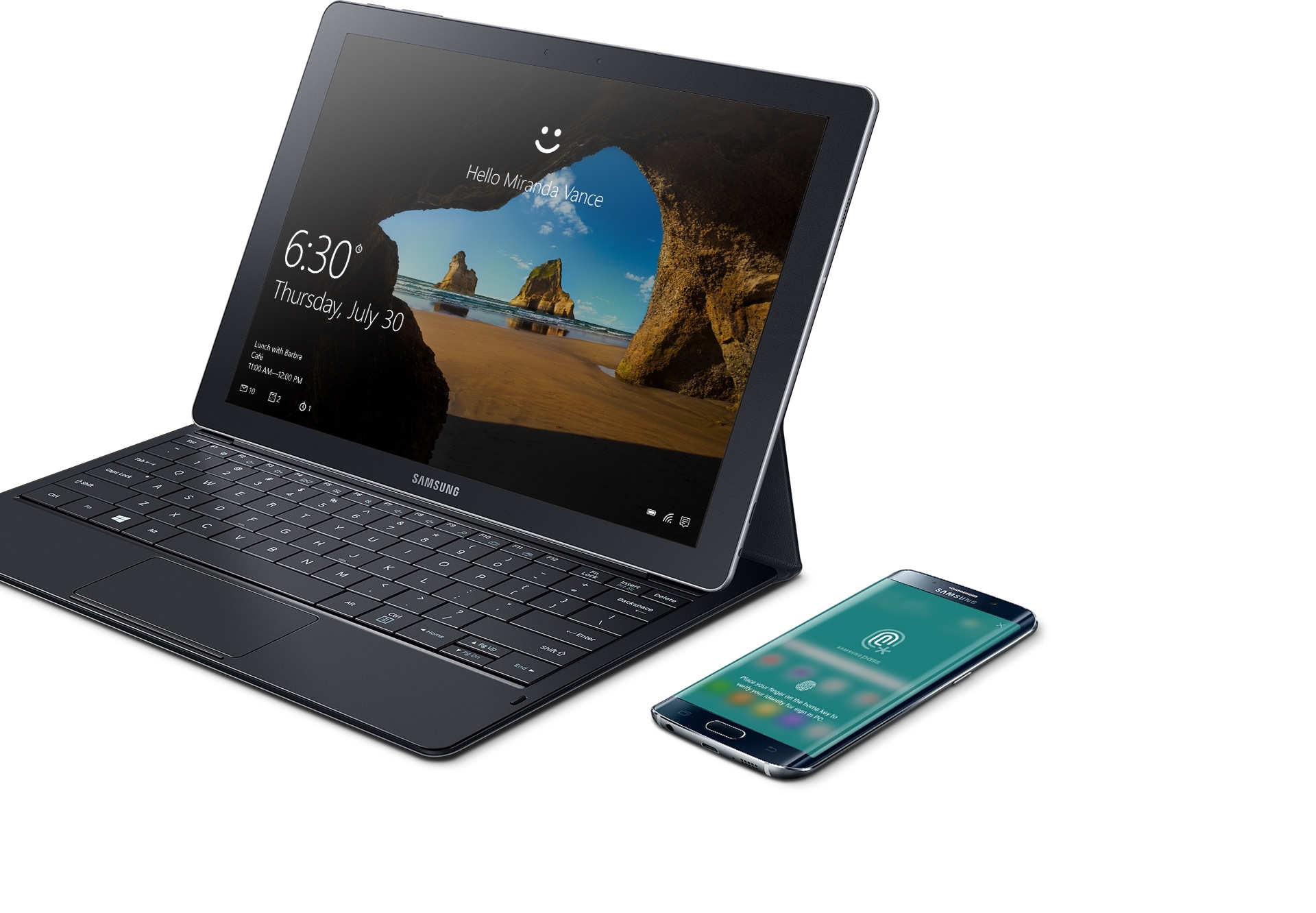 xy TabPro S appoggiato in verticale con attaccata la tastiera e uno smartphone Galaxy a fianco