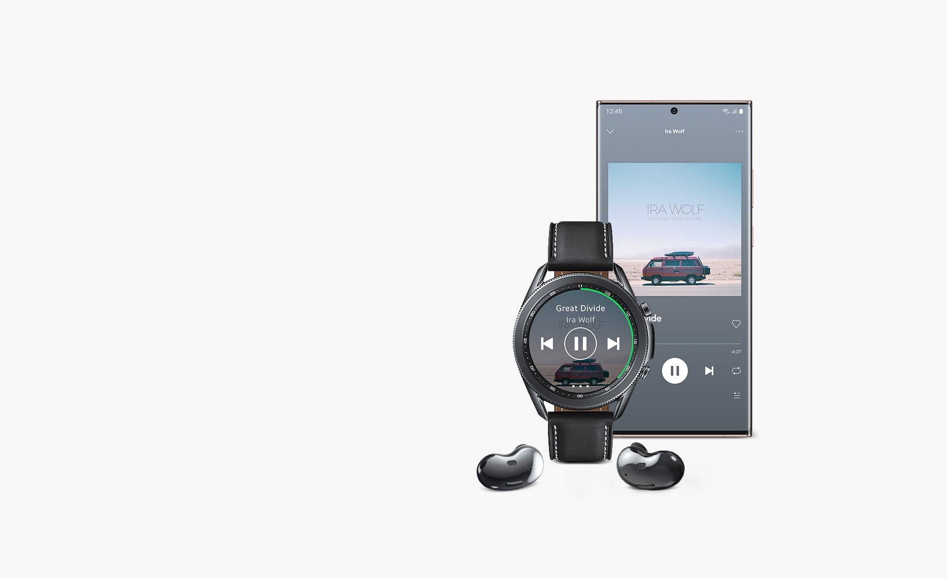 Front view of 45mm Galaxy Watch3 in Mystic Black next to a Galaxy smartphone and Galaxy Buds Live. The watch and smartphone display the same Spotify GUI, showing how you can play music on Galaxy Buds Live and seamlessly control it through Galaxy Watch3.