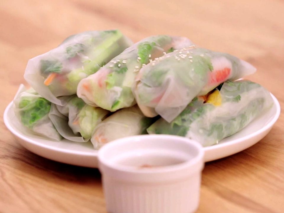 Vegetarian rice paper rolls with a peanut dipping sauce