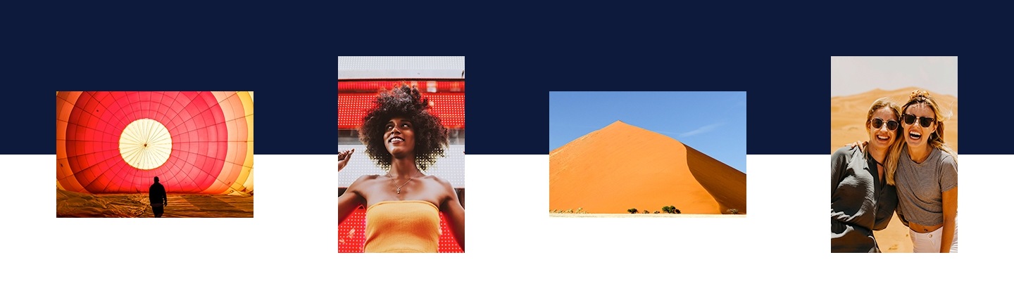 A wide shot of a man standing in front of a large hot air balloon being inflated from the ground. A portrait shot of a stylish woman with a colorful background. A wide shot of a tall sand dune. A portrait shot of two women in sunglasses smiling with the desert in the background.