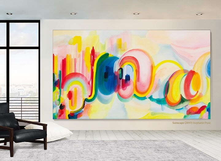 A simple living room environment with The Wall displaying an art piece