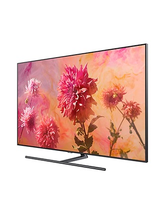 A front view of Samsung 75” QLED TV on a rectangular stand with red, purple and orange flowers displayed on screen