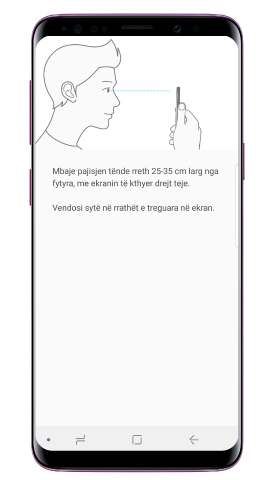 Mbajeni pajisjen 25~35cm larg nga fytyra me ekranin të drejtuar nga ju dhe shikoni në ekran