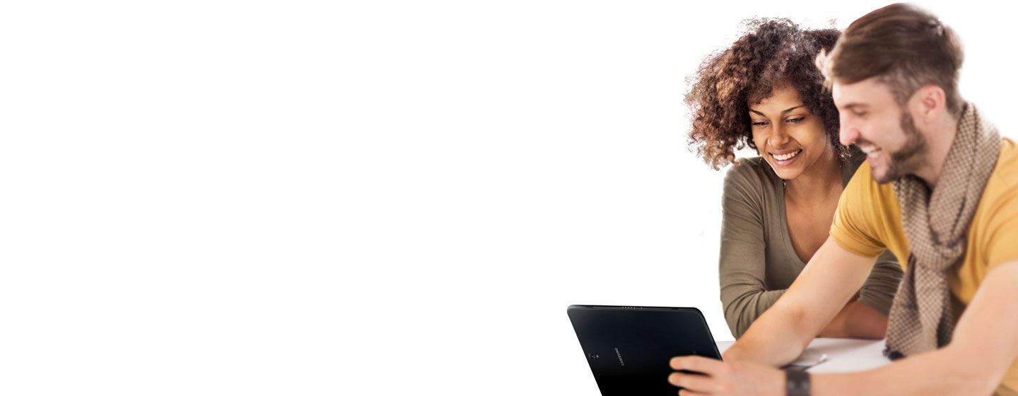 What can we do for you? Two person looking at a tablet