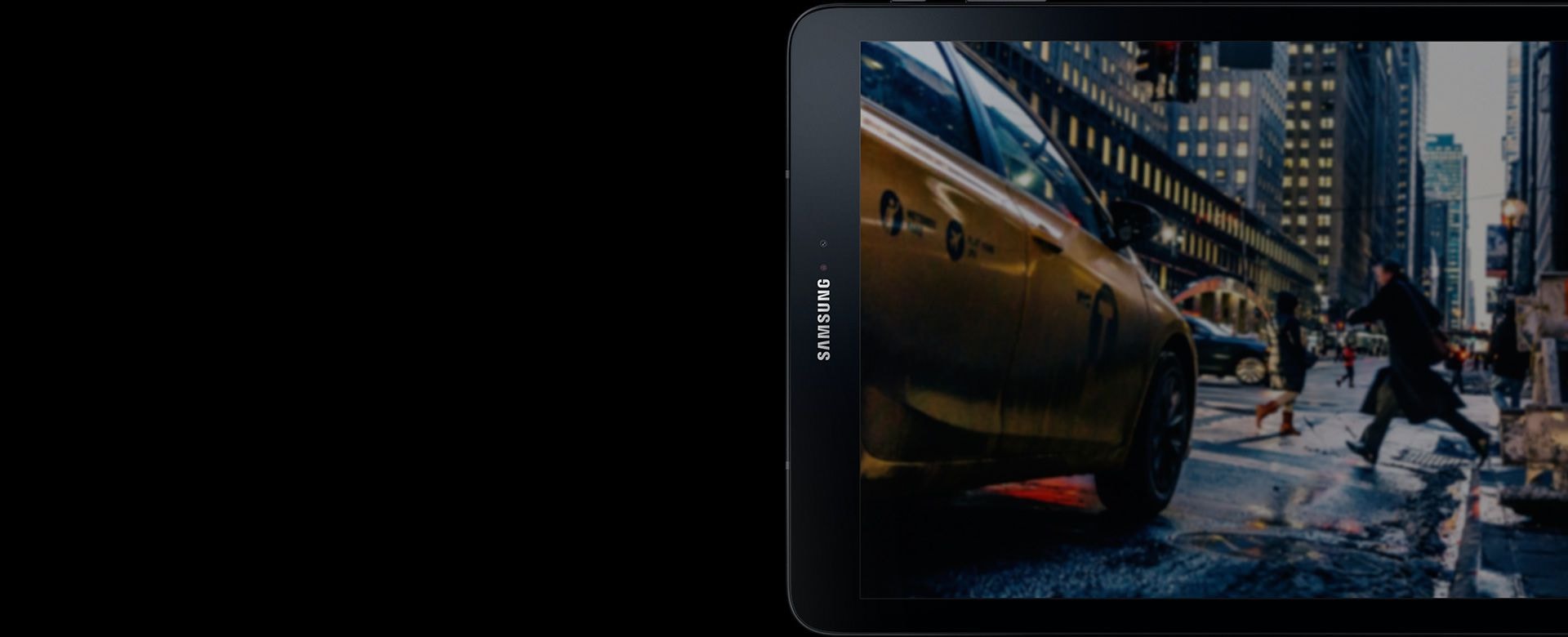 Galaxy Tab S3 standing sideways with image of a yellow cab downtown