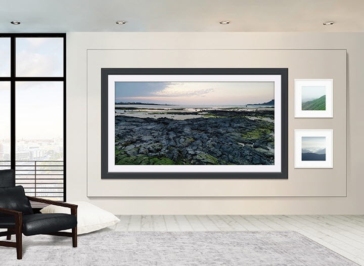 A simple living room environment with The Wall displaying a wall frame template