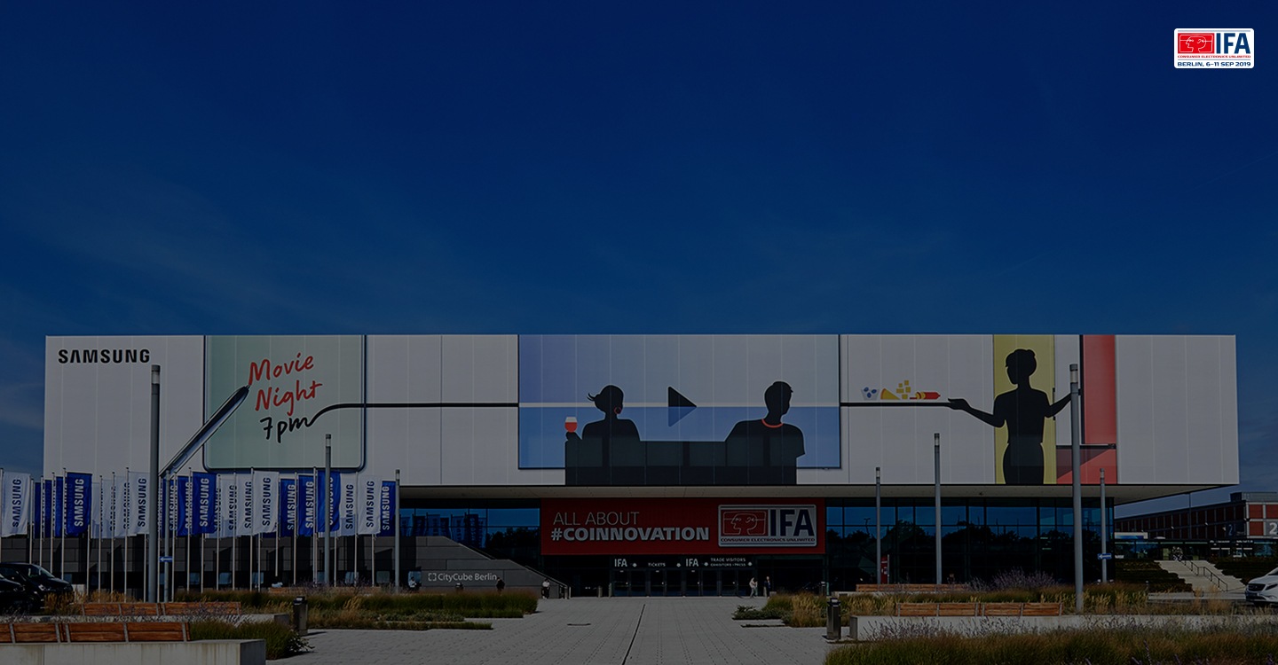 Exhibition building exterior bearing the Samsung logo in the upper left corner and a IFA banner in the façade