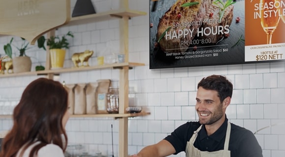A Samsung smart signage offering menus at a restaurant