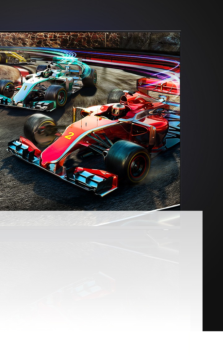 Une télévision de jeu montrant des voitures de Formule 1 bleues et rouges s’affrontant dans un jeu.