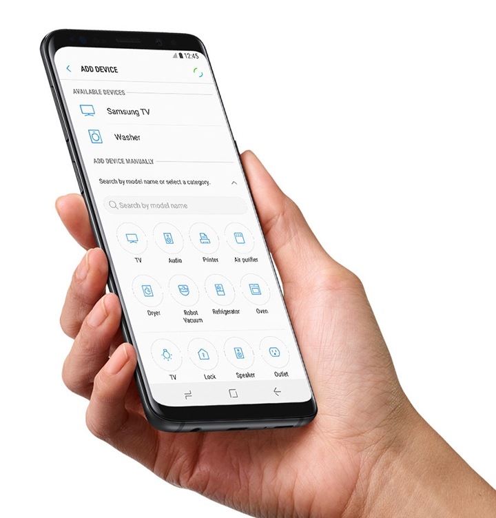 Abbildung einer Hand, die ein Galaxy Smartphone hält.