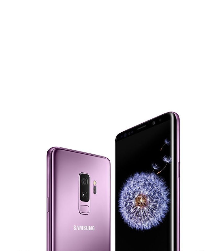 One Galaxy S9 seen from the front and Galaxy S9+ seen from the front and the rear in lilac purple. Displayed on Galaxy S9 is dandelion seeds and displayed on Galaxy S9+ is a dandelion.