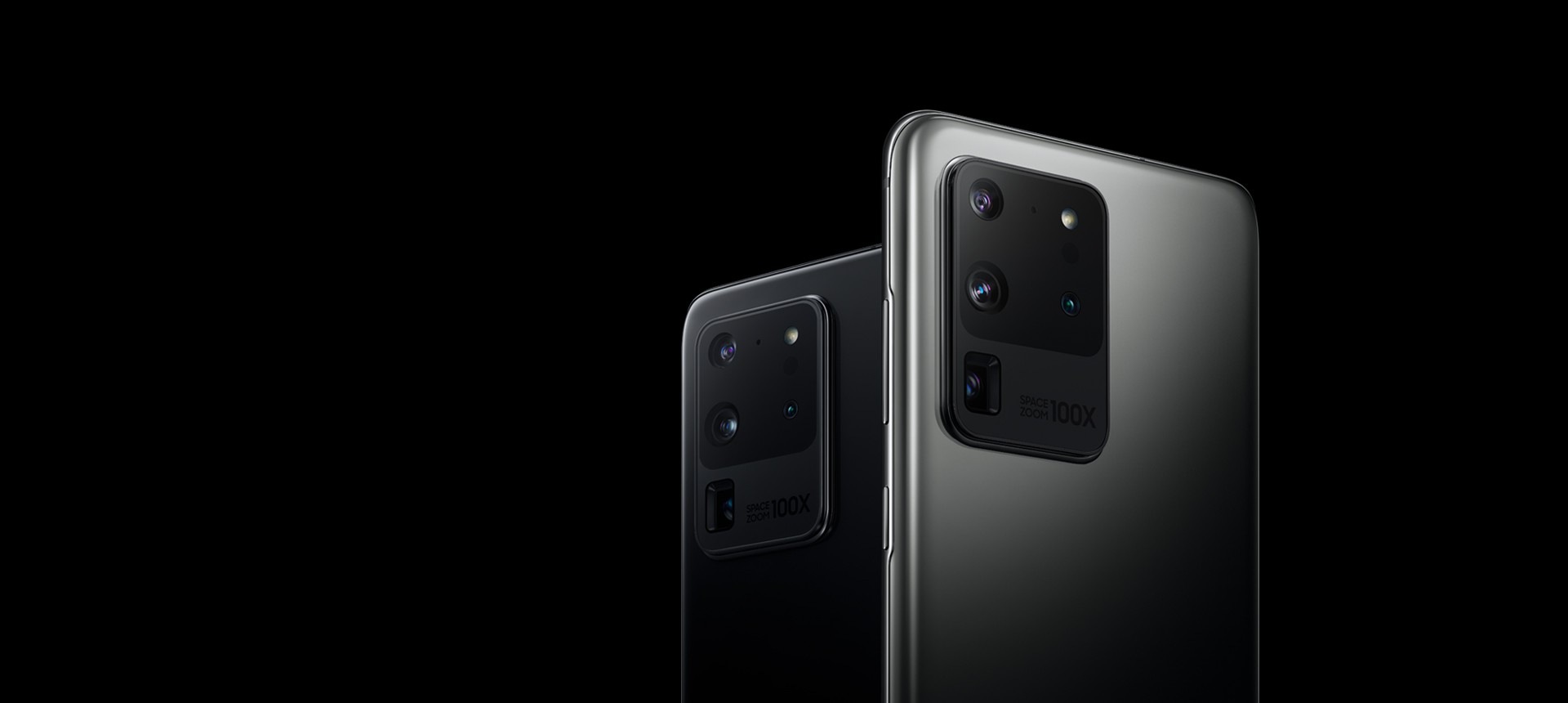 Two Galaxy S20 Ultra phones, one in Cosmic Black, one in Cosmic Gray, seen from the rear at three-quarter angles.