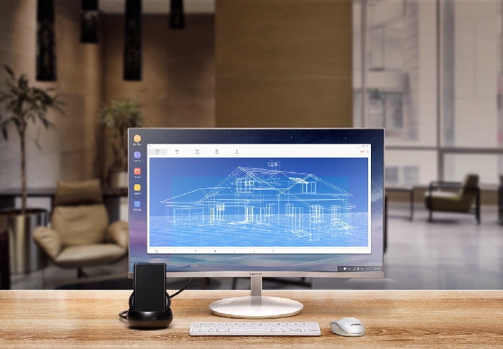 Image of Galaxy Note8, Samsung DeX station, monitor, keyboard, and mouse set up in a hotel lounge